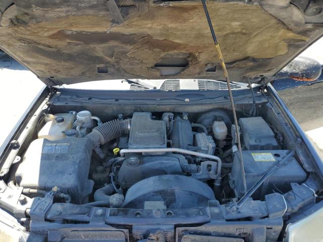 Photo 11 from auction – 2004 GMC ENVOY with VIN 1GKDT13S142331356