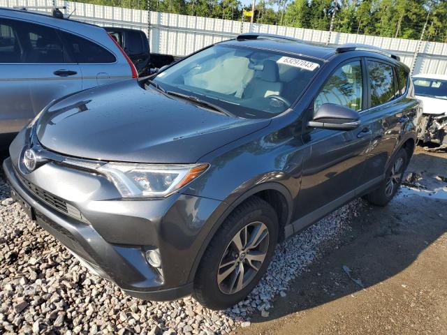 TOYOTA RAV4 XLE 2016 with VIN JTMWFREV9GD089619 - Photo from auction