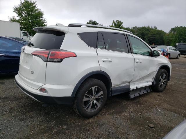 Photo 3 from auction – 2016 TOYOTA RAV4 XLE with VIN 2T3RFREV8GW481233