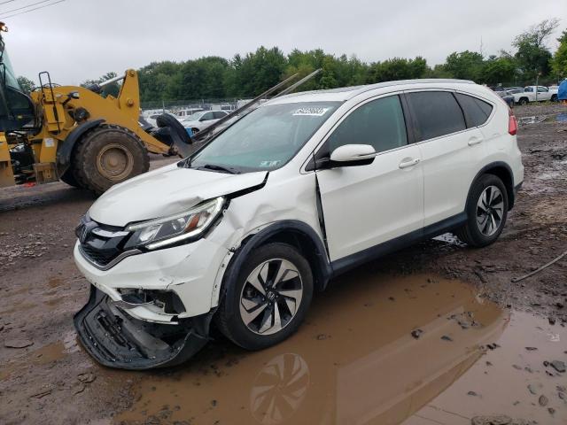 HONDA CR-V TOURI 2016 with VIN 5J6RM4H99GL052963 - Photo from auction