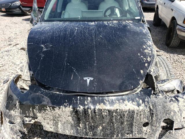 Photo 11 from auction – 2022 TESLA MODEL Y with VIN 7SAYGDEF0NF358911
