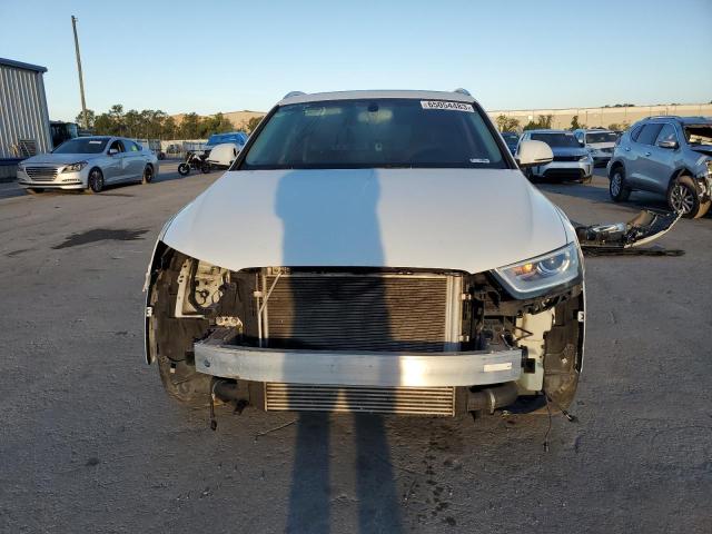 Photo 5 from auction – 2015 AUDI Q3 PREMIUM with VIN WA1EFCFS5FR010116