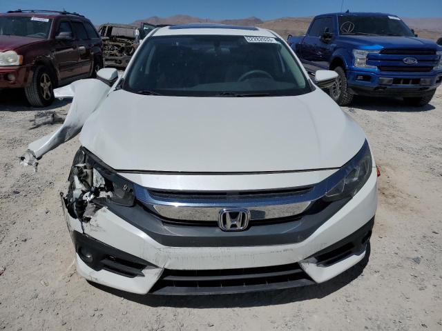 Photo 5 from auction – 2016 HONDA CIVIC EX with VIN 19XFC1F30GE004575
