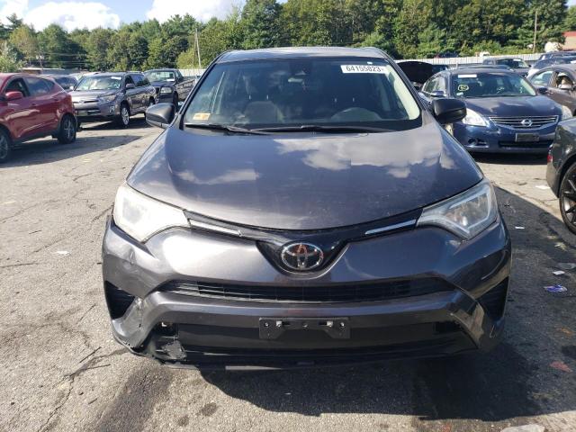 Photo 5 from auction – 2018 TOYOTA RAV4 LE with VIN JTMBFREV3JJ246486