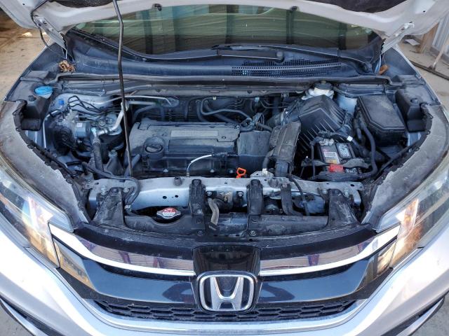 Photo 12 from auction – 2015 HONDA CR-V LX with VIN 2HKRM3H33FH530325