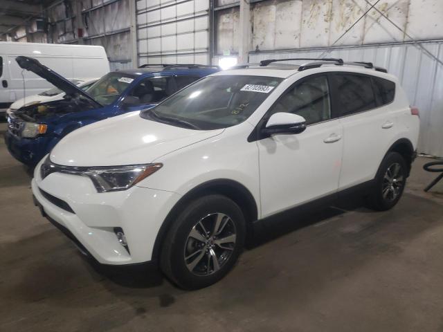 Photo 1 from auction – 2017 TOYOTA RAV4 XLE with VIN JTMRFREV9HJ170734