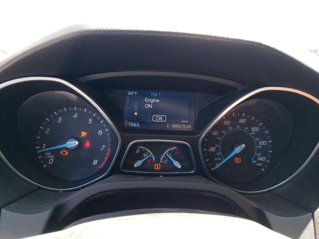 Photo 9 from auction – 2014 FORD FOCUS SE with VIN 1FADP3F21EL375267