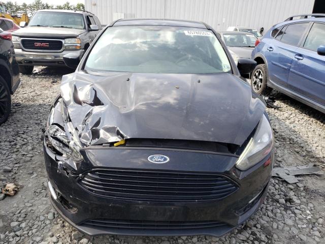 Photo 5 from auction – 2018 FORD FOCUS SE with VIN 1FADP3F22JL225937
