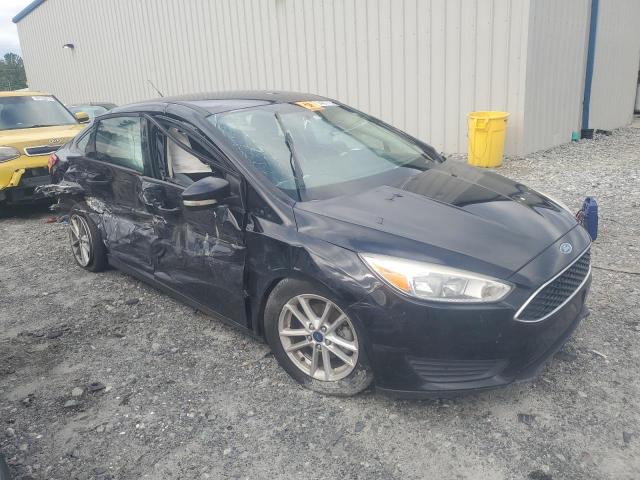 Снимка 4 от търг – 2017 FORD FOCUS SE с VIN 1FADP3F21HL262360