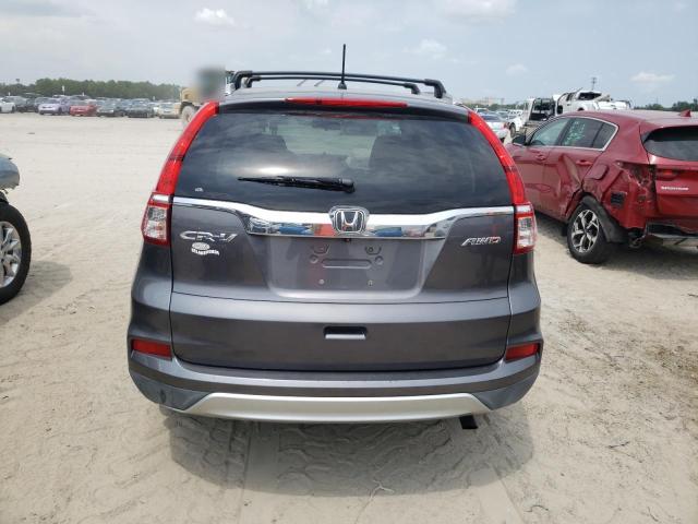 Photo 6 from auction – 2015 HONDA CR-V with VIN 2HKRM4H59FH619629