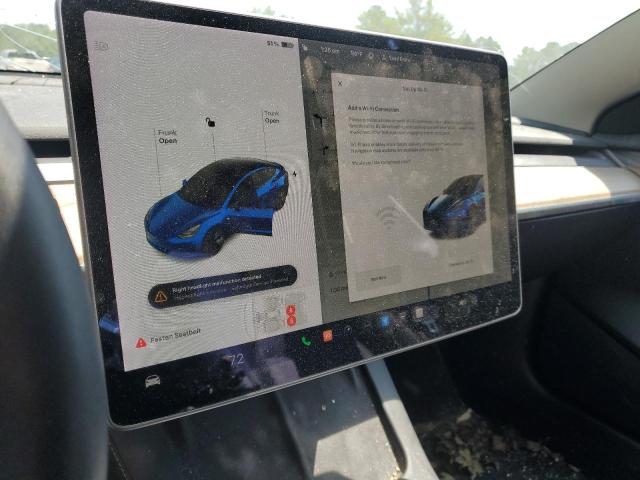 Снимка 9 от търг – 2021 TESLA MODEL 3 с VIN 5YJ3E1EB9MF029499