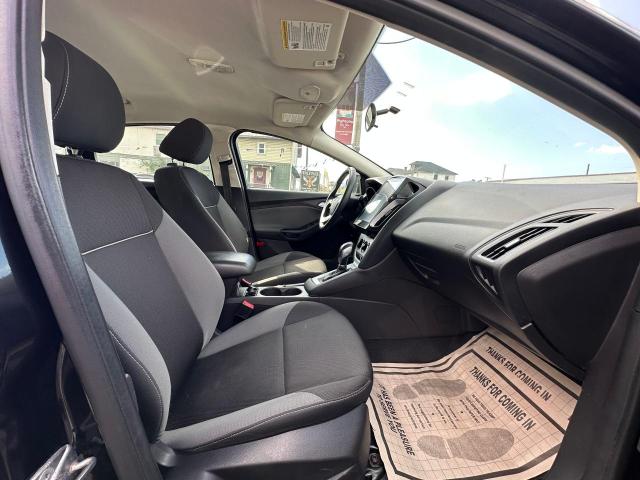 Photo 5 from auction – 2014 FORD FOCUS SE with VIN 1FADP3F25EL448401