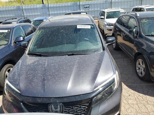 Photo 5 from auction – 2021 HONDA PASSPORT E with VIN 5FNYF8H53MB041987