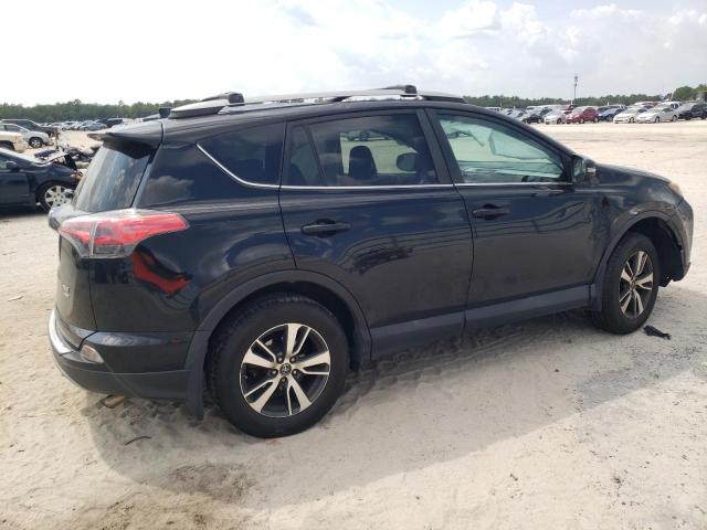Photo 3 from auction – 2017 TOYOTA RAV4 XLE with VIN 2T3RFREV8HW574884