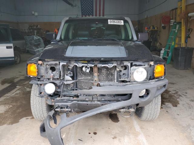 Photo 5 from auction – 2007 HUMMER H3 with VIN 5GTDN13E678178709
