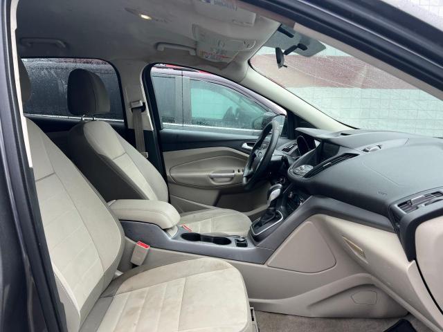 Photo 5 from auction – 2014 FORD ESCAPE SE with VIN 1FMCU9GX9EUA33857