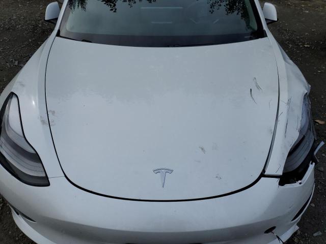 Photo 11 from auction – 2021 TESLA MODEL 3 with VIN 5YJ3E1EA0MF085225