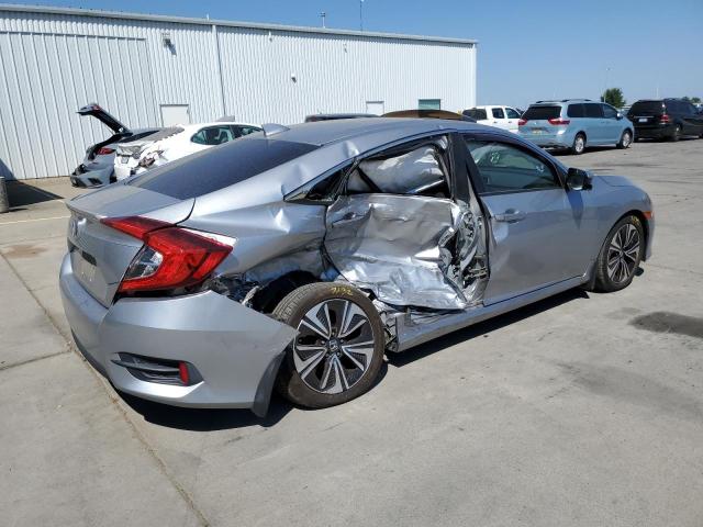 Photo 3 from auction – 2018 HONDA CIVIC EX with VIN JHMFC1F38JX042402