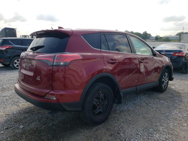 Photo 3 from auction – 2018 TOYOTA RAV4 LE with VIN 2T3BFREV9JW711239