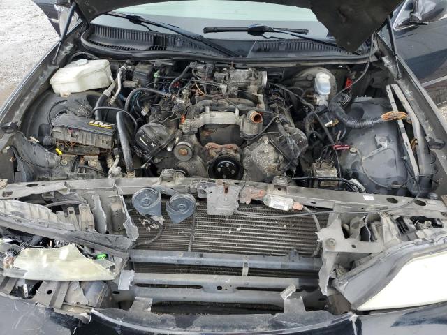 Zdjęcie 11 z aukcji – 2003 LINCOLN TOWN CAR E z VIN 1LNHM81W33Y649799