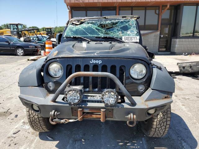 Photo 5 from auction – 2014 JEEP WRANGLER U with VIN 1C4BJWFG0EL309082