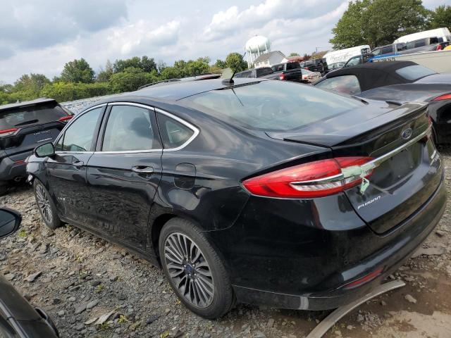 Photo 2 from auction – 2018 FORD FUSION TIT with VIN 3FA6P0RU3JR116702
