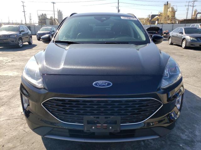 Photo 5 from auction – 2021 FORD ESCAPE SEL with VIN 1FMCU9H65MUA64043