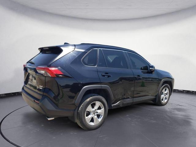Photo 3 from auction – 2020 TOYOTA RAV4 XLE with VIN JTMP1RFV0LD051109