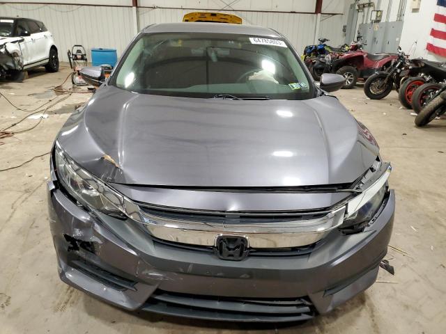 Photo 5 from auction – 2018 HONDA CIVIC LX with VIN 19XFC2F55JE033147