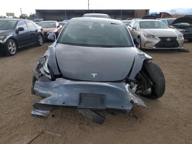 Photo 5 from auction – 2022 TESLA MODEL 3 with VIN 5YJ3E1EB3NF133049