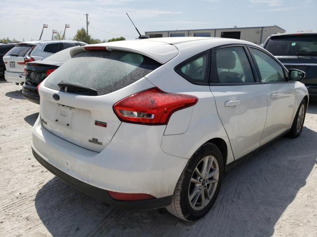 Photo 3 from auction – 2016 FORD FOCUS SE with VIN 1FADP3K24GL352526