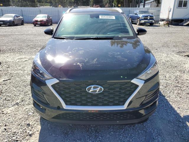 Photo 5 from auction – 2020 HYUNDAI TUCSON LIM with VIN KM8J3CA44LU250445