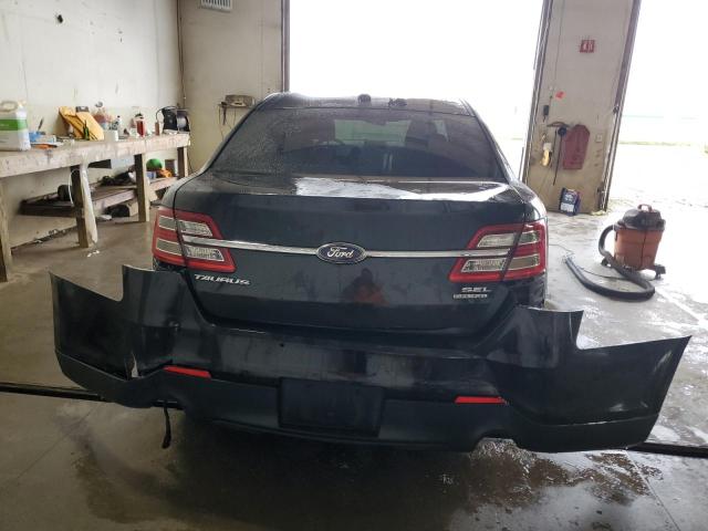 Photo 6 from auction – 2013 FORD TAURUS SEL with VIN 1FAHP2E84DG114529