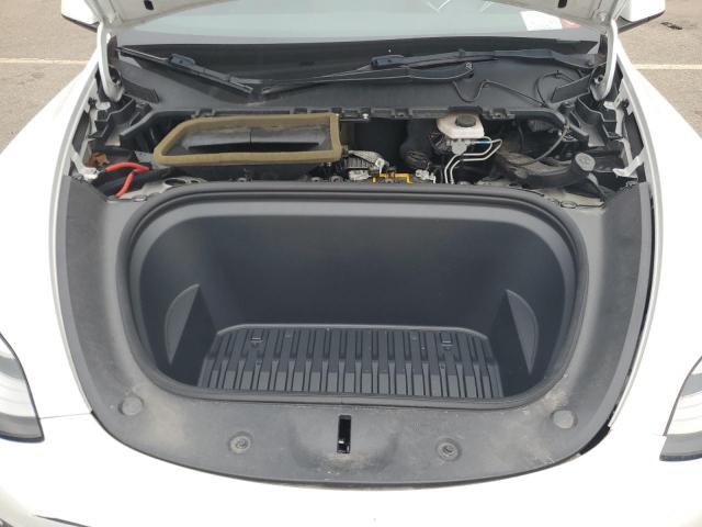 Photo 11 from auction – 2021 TESLA MODEL Y with VIN 5YJYGDED8MF110724