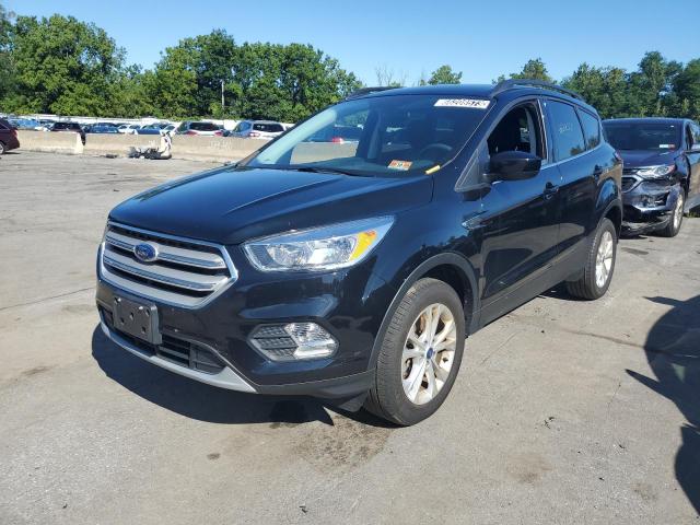 FORD ESCAPE SE 2018 with VIN 1FMCU9GD2JUA43811 - Photo from auction