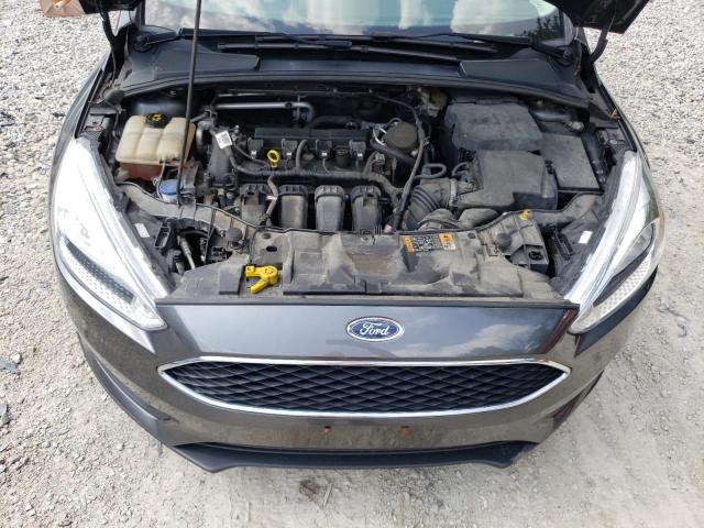 Photo 11 from auction – 2015 FORD FOCUS SE with VIN 1FADP3F24FL383462