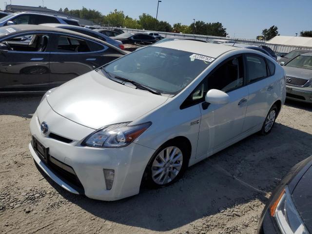 TOYOTA PRIUS PLUG 2012 with VIN JTDKN3DP7C3027282 - Photo from auction