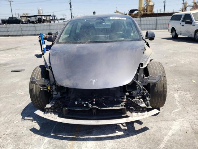 Photo 5 from auction – 2022 TESLA MODEL 3 with VIN 5YJ3E1EB6NF199272