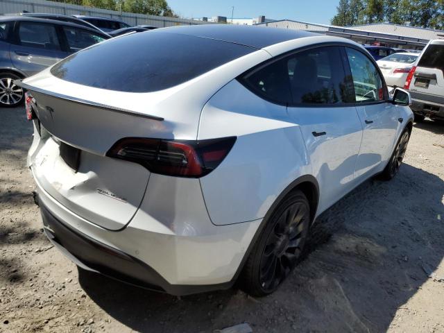 Photo 3 from auction – 2022 TESLA MODEL Y with VIN 7SAYGDEF6NF410204