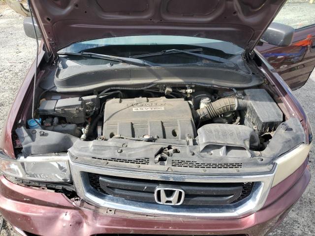 Photo 11 from auction – 2009 HONDA RIDGELINE with VIN 5FPYK16229B105236
