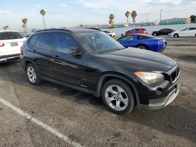Photo 4 from auction – 2014 BMW X1 SDRIVE2 with VIN WBAVM1C58EVW48796