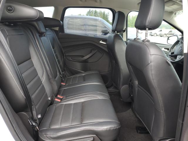Снимка 11 от търг – 2018 FORD ESCAPE TIT с VIN 1FMCU9J96JUB84577