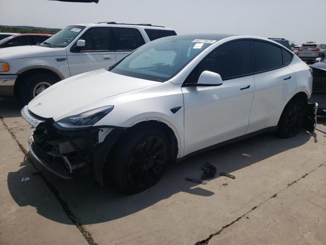 TESLA MODEL Y 2022 with VIN 7SAYGDEE5NF318203 - Photo from auction