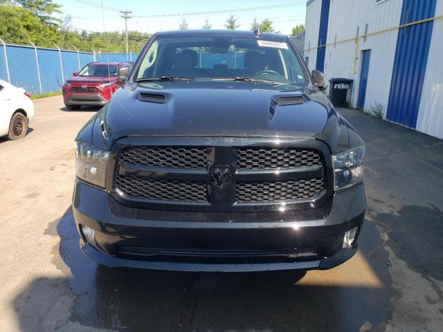 Photo 5 from auction – 2022 RAM 1500 CLASS with VIN 3C6RR7KTXNG258680