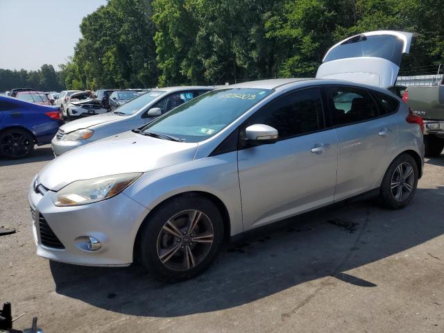 FORD FOCUS SE 2014 with VIN 1FADP3K29EL293423 - Photo from auction