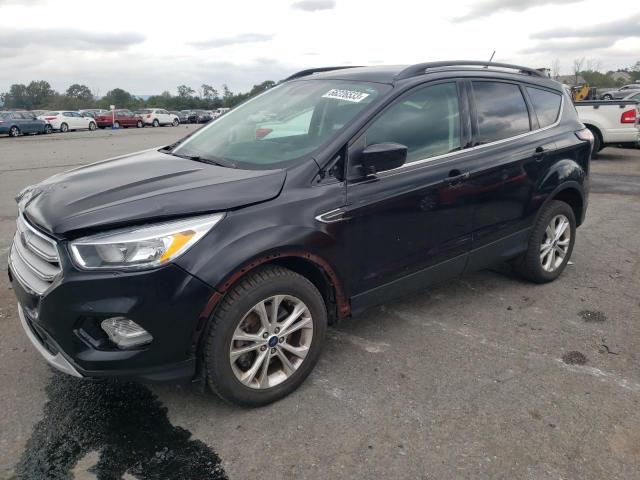 FORD ESCAPE SE 2018 with VIN 1FMCU9GD0JUA15716 - Photo from auction