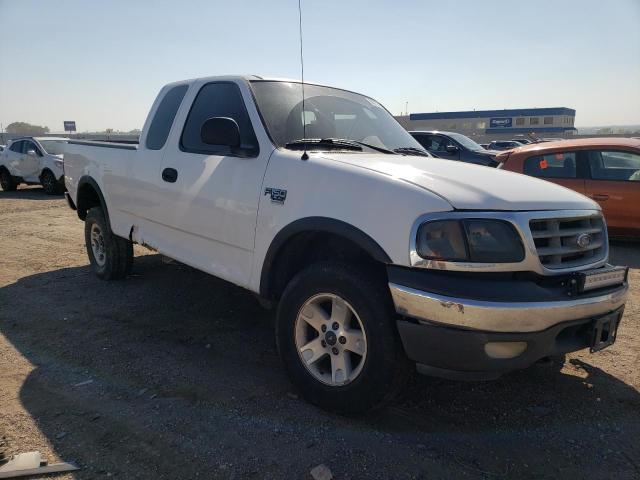 Снимка 4 от търг – 2002 FORD F150 с VIN 1FTRX18LX2KC01628