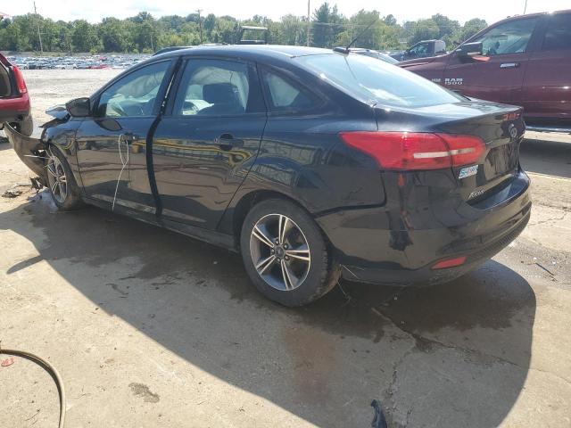 Photo 2 from auction – 2018 FORD FOCUS SE with VIN 1FADP3FE7JL215995
