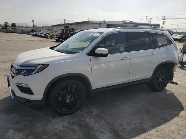 HONDA PILOT ELIT 2017 with VIN 5FNYF6H08HB057486 - Photo from auction