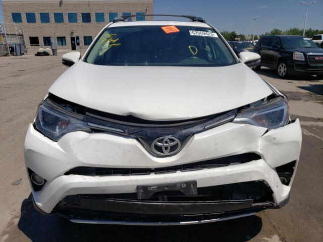 Photo 5 from auction – 2016 TOYOTA RAV4 XLE with VIN 2T3RFREV8GW517678
